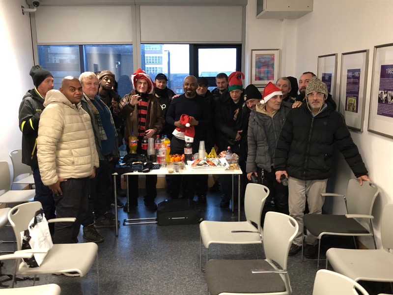 Community celebration event with people smiling